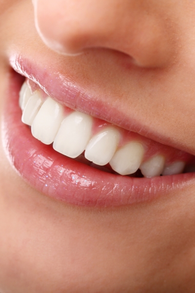 Achieve a younger, healthier appearance with a confident smile.