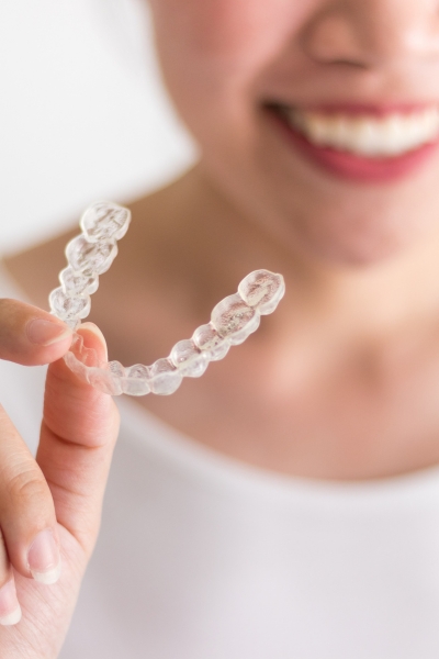 Removability — eat, drink, brush, and floss without restrictions.