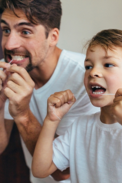 Teach kids healthy brushing and flossing habits.